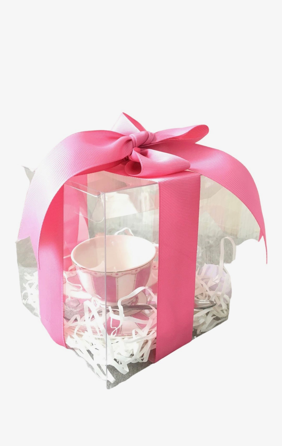 Taza pequeña en caja transparente