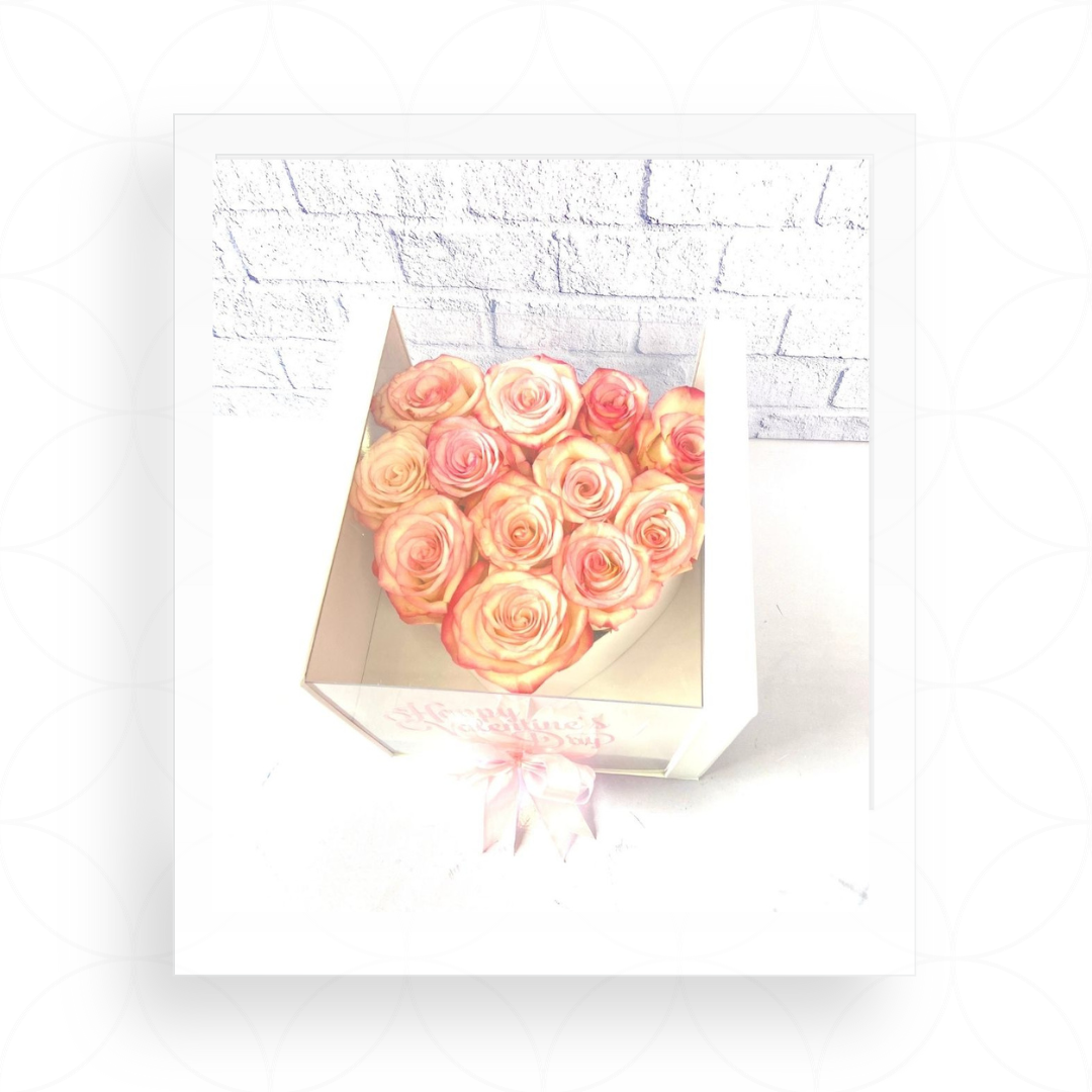 Arreglo de flores en caja corazon blanca con gaveta